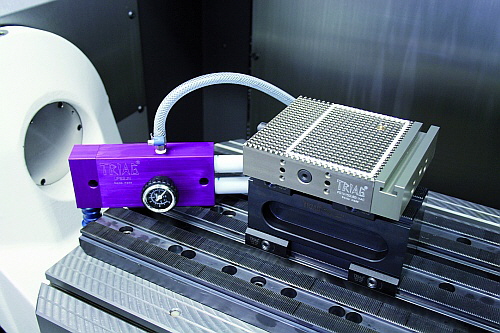Triag AG - PowerClamp mit Vakuumtisch Triag AG - PowerClamp mit Vakuumtisch